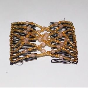 Cute gold and pink tone stretchy hair clip